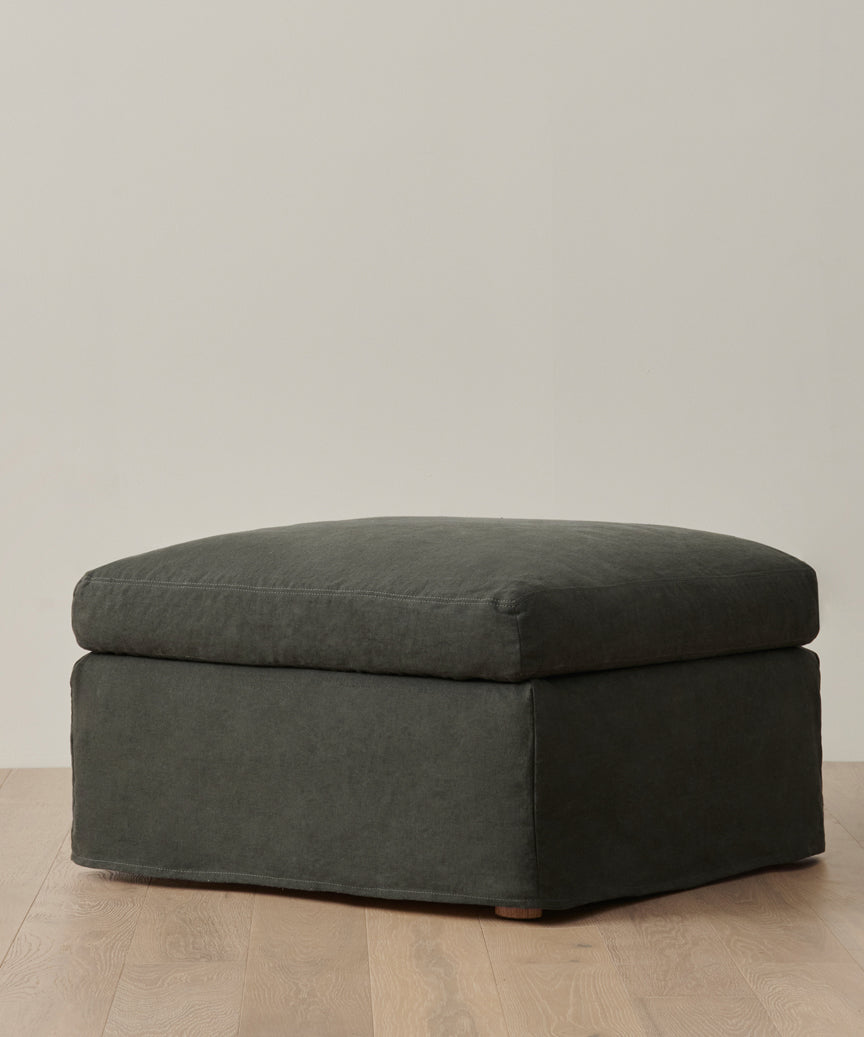 https://cdn.shopify.com/s/files/1/0565/1234/8333/files/upholstered-linen-harbor-ottoman-slate-linen-01.jpg?v=1762182729