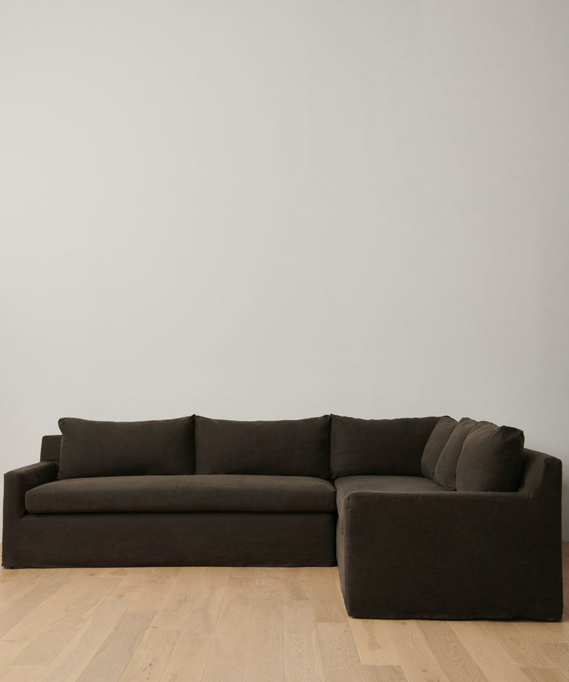 https://cdn.shopify.com/s/files/1/0565/1234/8333/files/upholstered-linen-harbor-sectional-jet-linen-1.jpg?v=1762182762