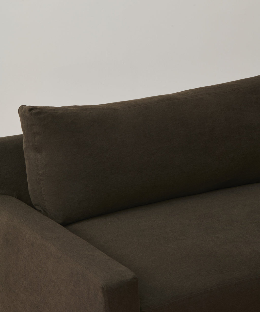 https://cdn.shopify.com/s/files/1/0565/1234/8333/files/upholstered-linen-harbor-sofa-jet-linen-2.jpg?v=1744413404