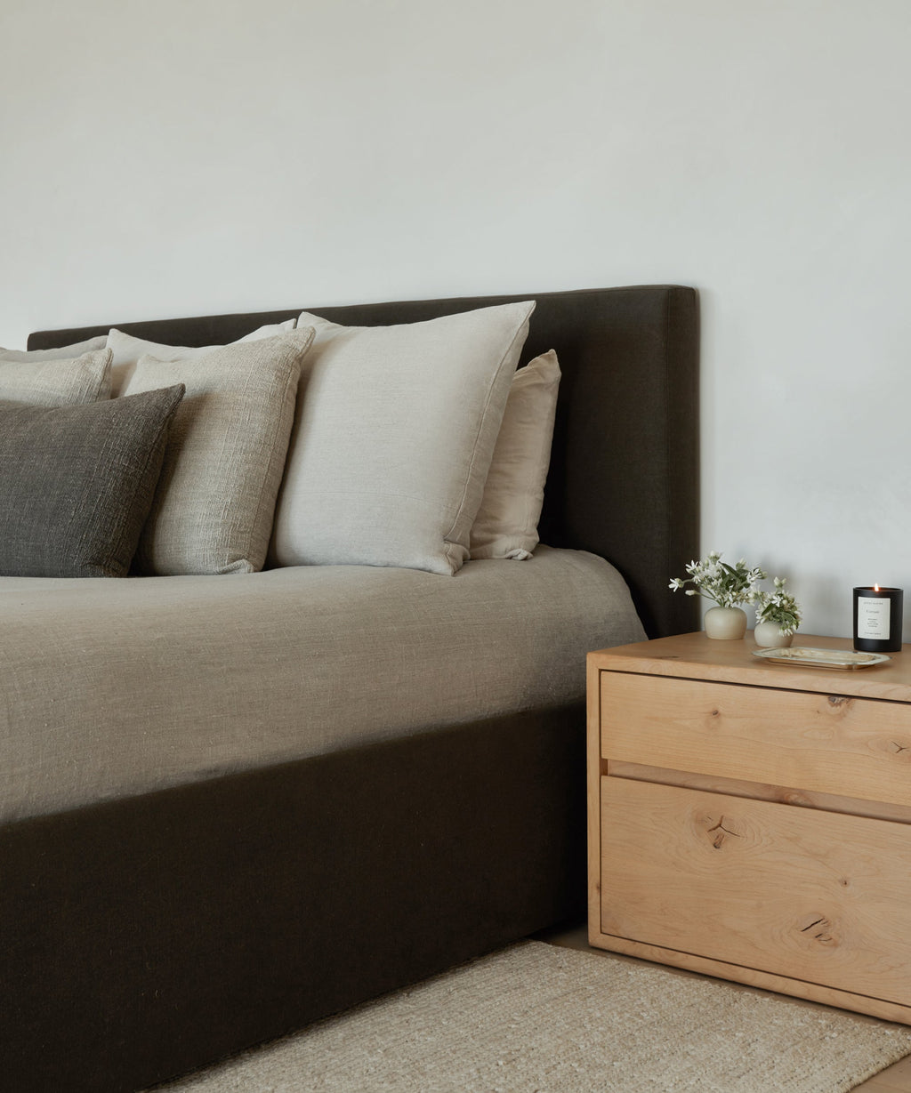 https://cdn.shopify.com/s/files/1/0565/1234/8333/products/upholstered-linen-pacific-bed-furniture-jet-1.jpg?v=1680113631