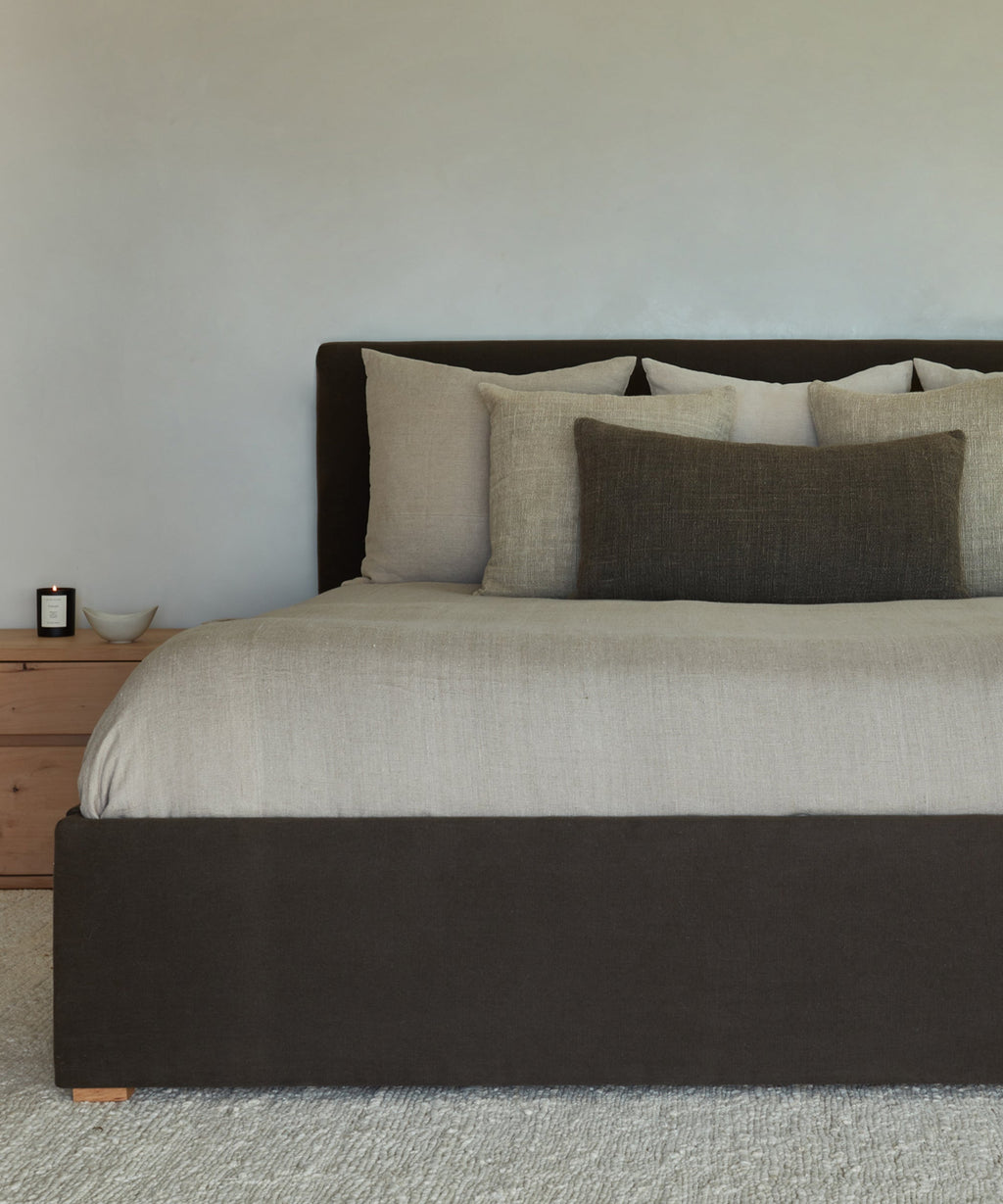 https://cdn.shopify.com/s/files/1/0565/1234/8333/products/upholstered-linen-pacific-bed-furniture-jet-2.jpg?v=1680113631