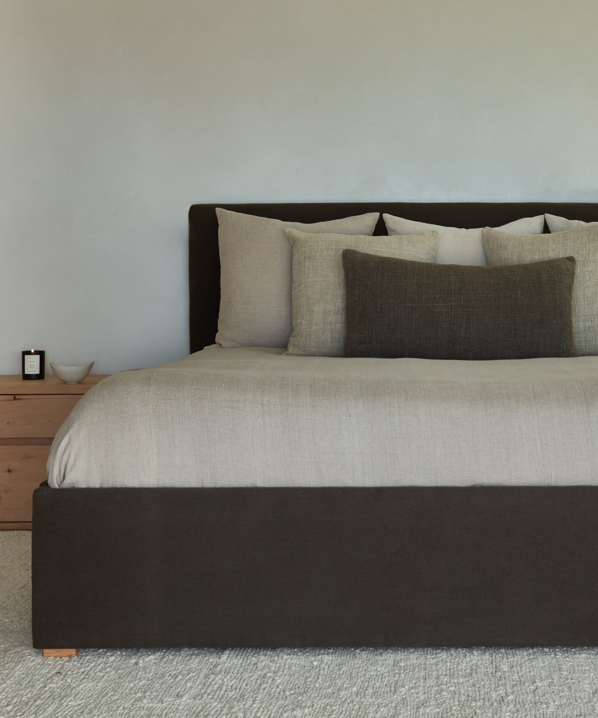 https://cdn.shopify.com/s/files/1/0565/1234/8333/products/upholstered-linen-pacific-bed-furniture-jet-2.jpg?v=1680113631
