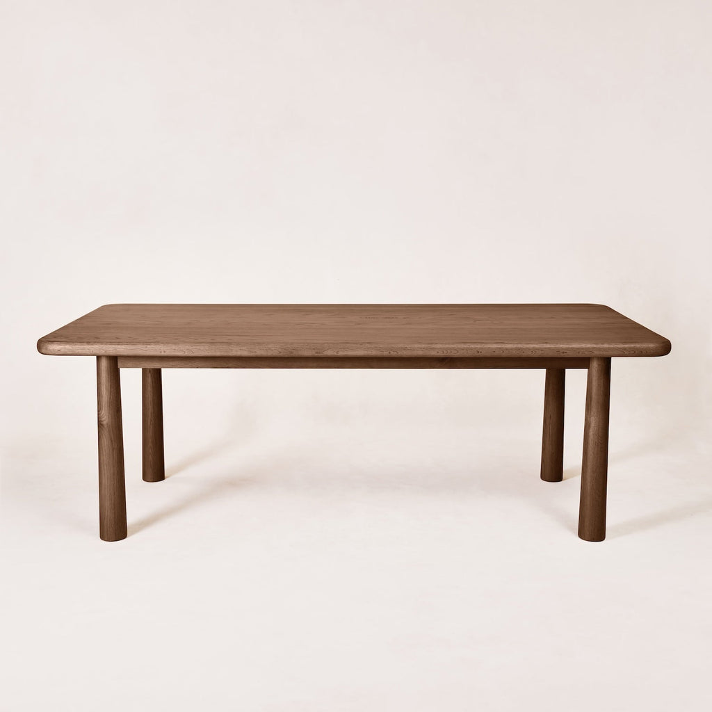 https://cdn.shopify.com/s/files/1/0593/2217/1565/files/walnut-solid-dining-table.jpg?v=1738263870