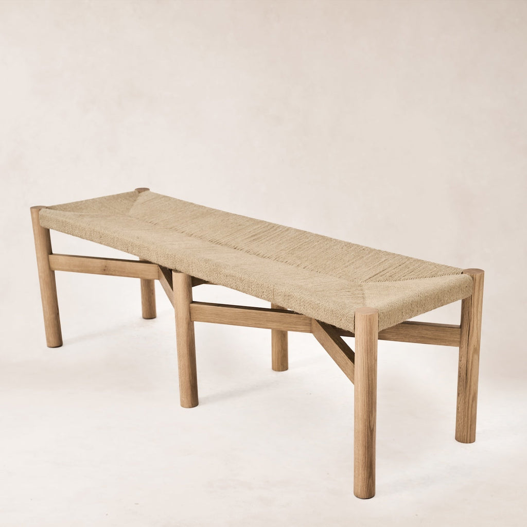 https://cdn.shopify.com/s/files/1/0593/2217/1565/files/woven-dining-bench.jpg?v=1766180739