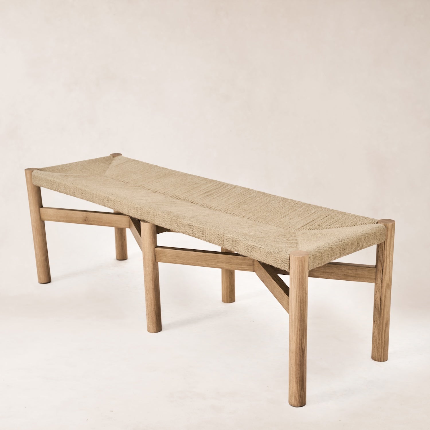 https://cdn.shopify.com/s/files/1/0593/2217/1565/files/woven-dining-bench.jpg?v=1766180739