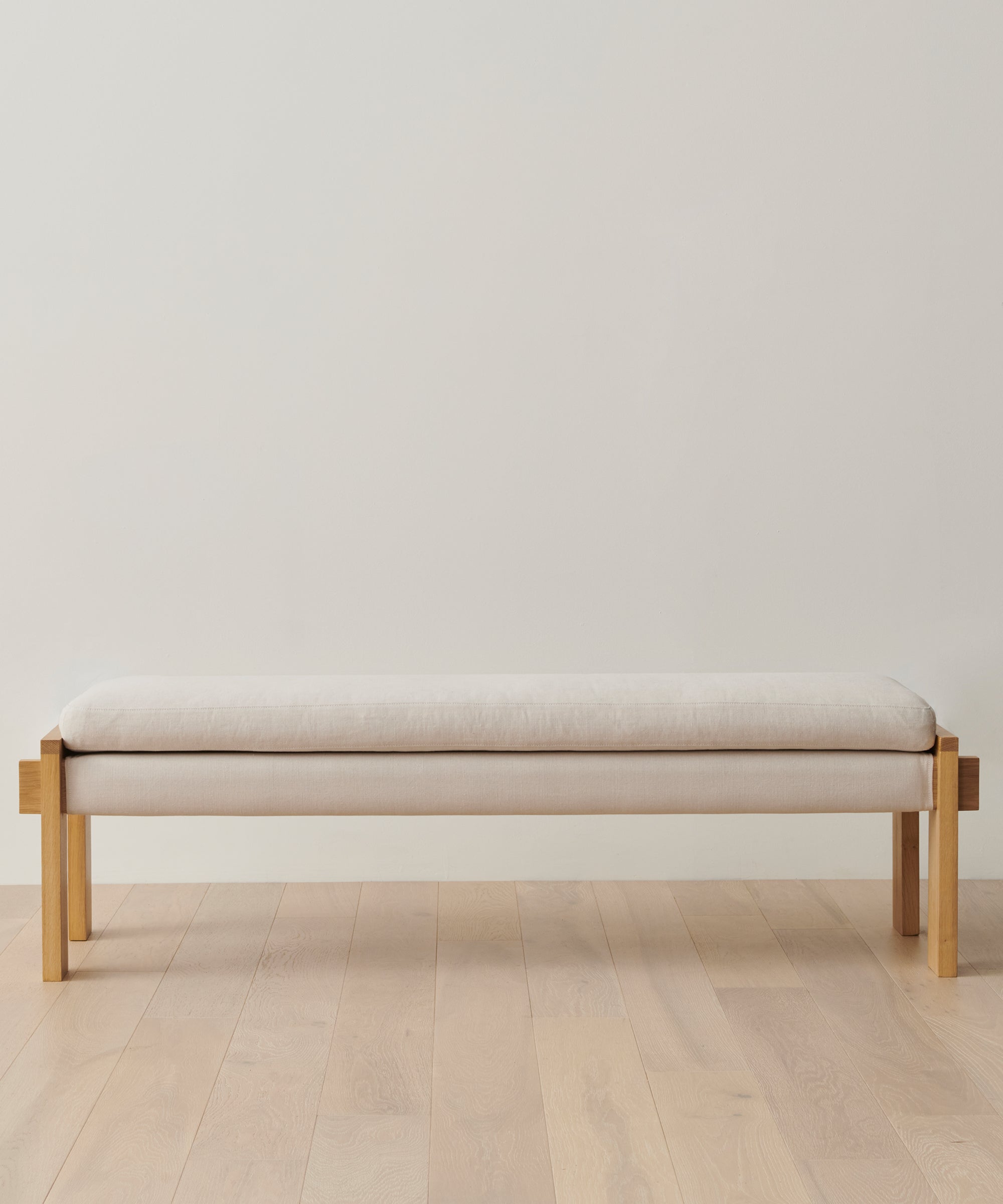 https://cdn.shopify.com/s/files/1/0565/1234/8333/products/ynez-bench-white-oak-upholstered-linen-natural-linen-01.jpg?v=1762183162