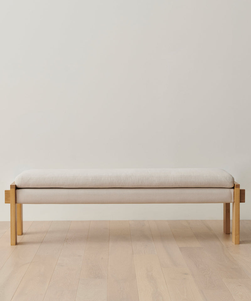 https://cdn.shopify.com/s/files/1/0565/1234/8333/products/ynez-bench-white-oak-upholstered-linen-natural-linen-01.jpg?v=1762183162