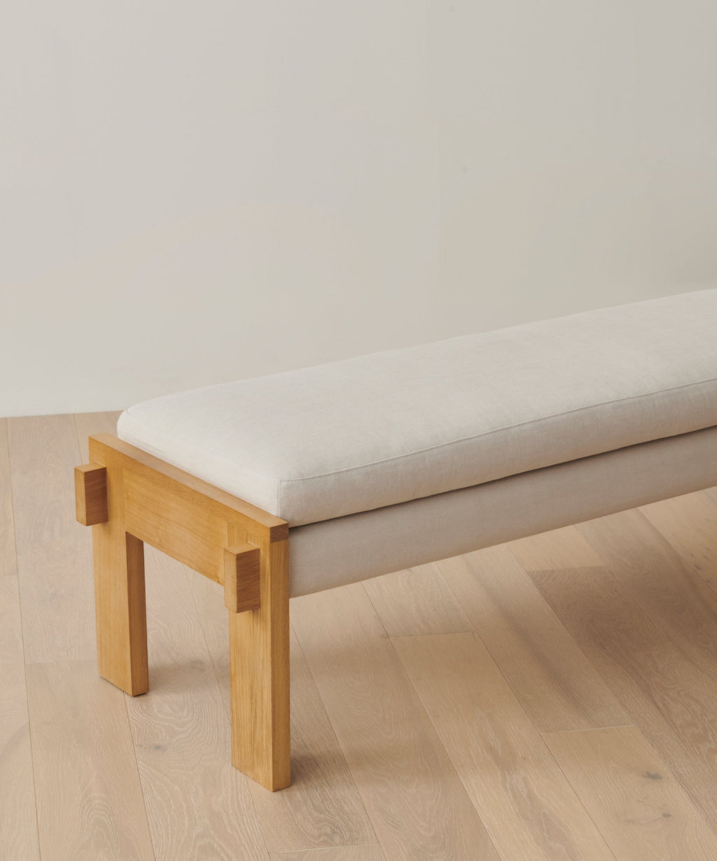 https://cdn.shopify.com/s/files/1/0565/1234/8333/products/ynez-bench-white-oak-upholstered-linen-natural-linen-02.jpg?v=1725496478
